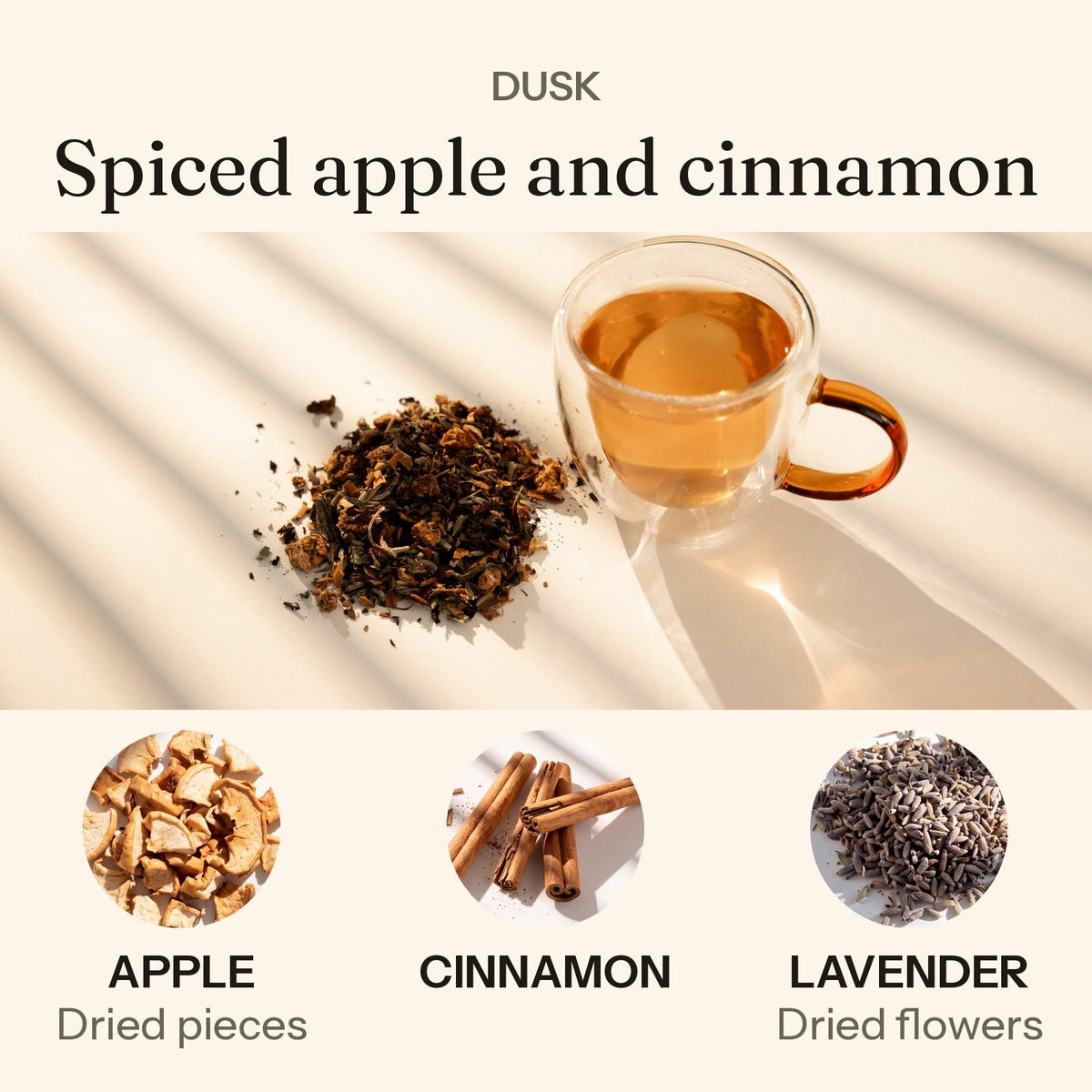 Dusk: spiced apple and cinnamon. Dusk brewed in a clear glass cup beside the loose blend, with apple, cinnamon and lavender.