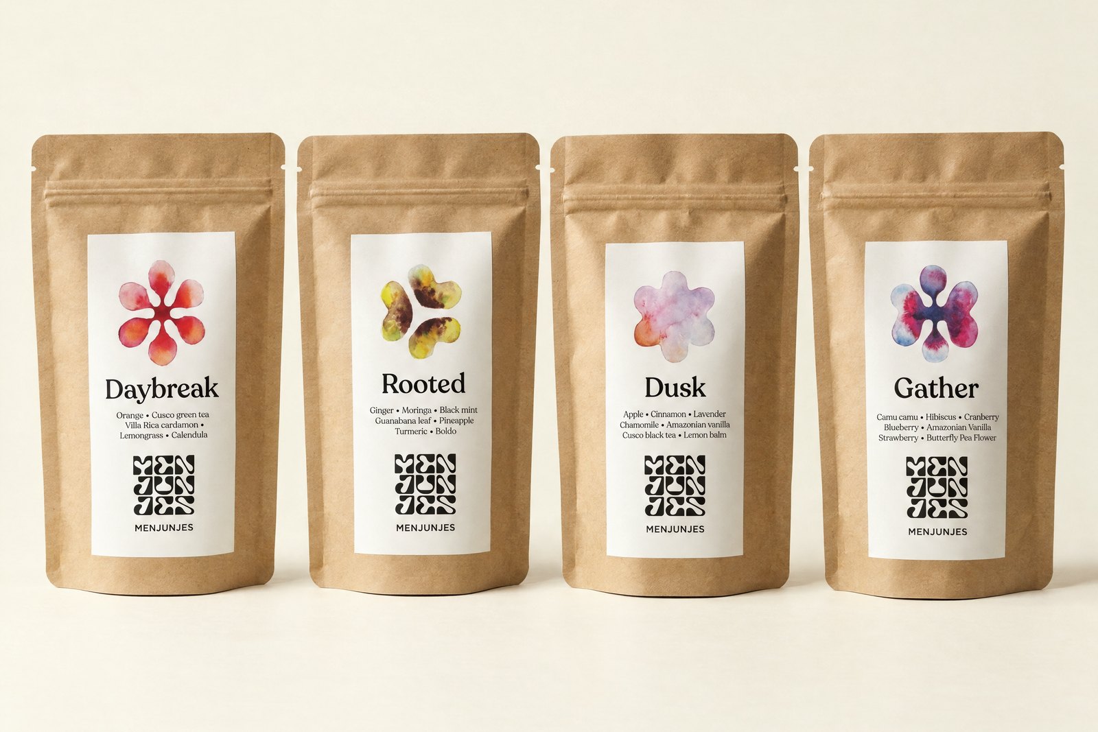 The four Menjunjes blends in kraft pouches: Daybreak, Rooted, Dusk and Gather