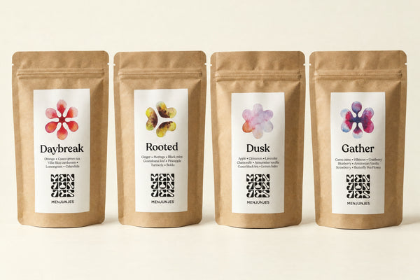 The four Menjunjes blends in the Discovery Box: Daybreak, Rooted, Dusk and Gather, each in a kraft pouch.